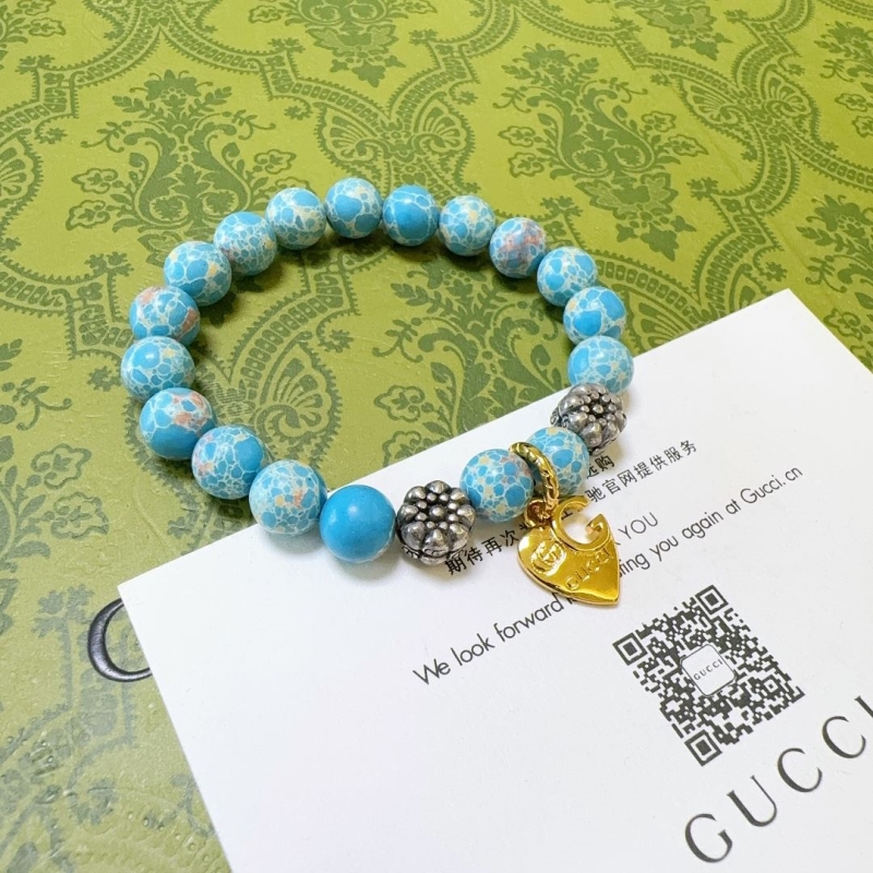 G*u*i bracelets